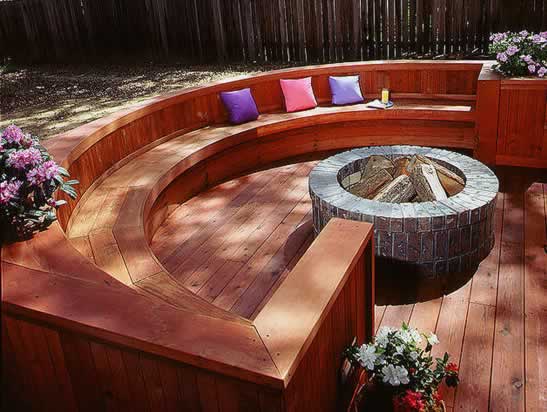 Redwood boards are used for parts of this firepit setting.